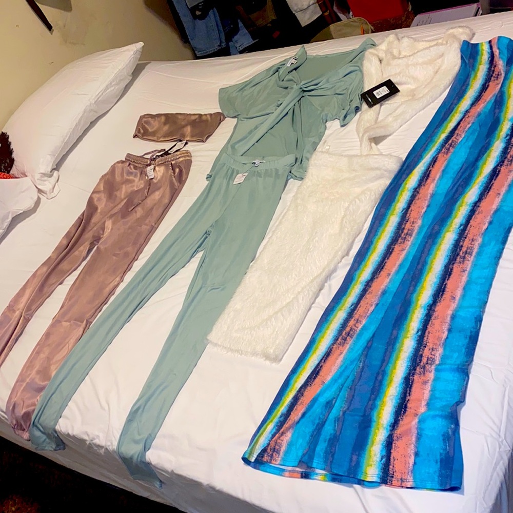 4 brand new never worn outfits with tags on still